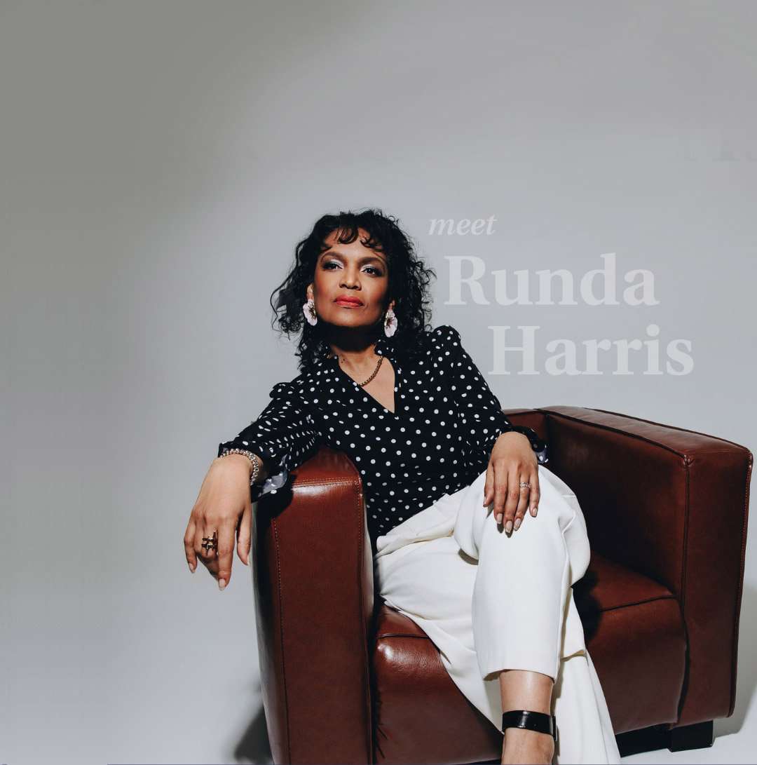 Runda Harris seated in a chair